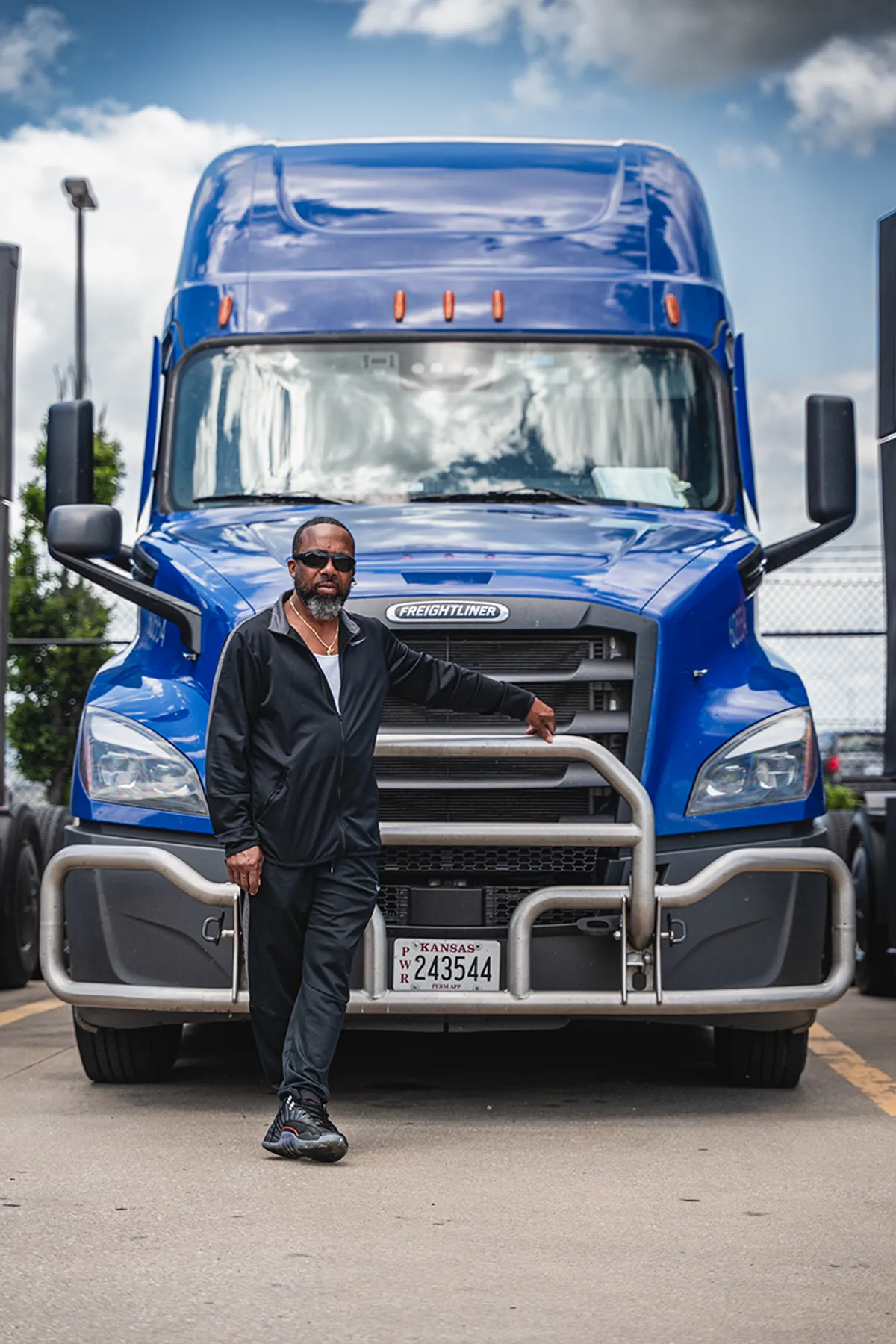 A truck driver looking out the window