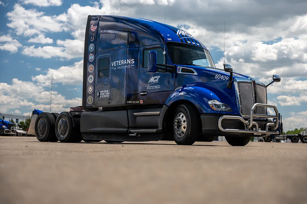 A white truck on a scenic road